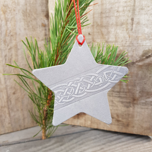 Silver grey leather star christmas decoration with celtic knot design