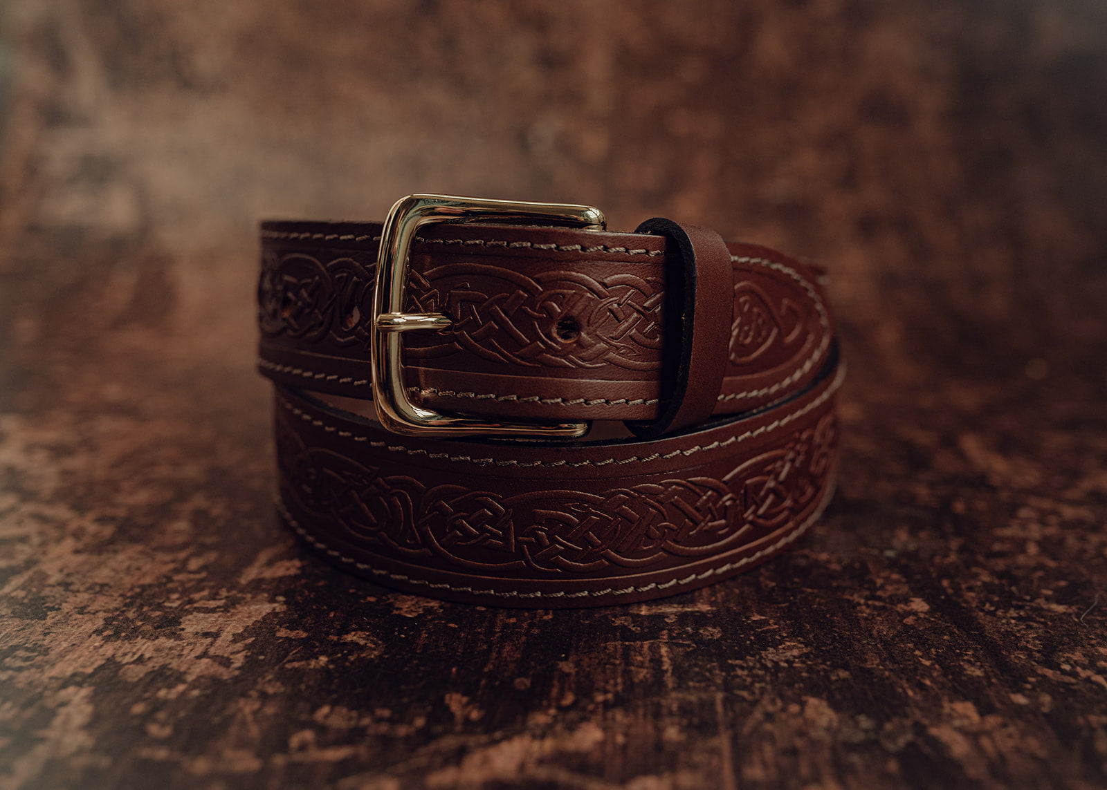 Brown handmade belt with celtic knot design