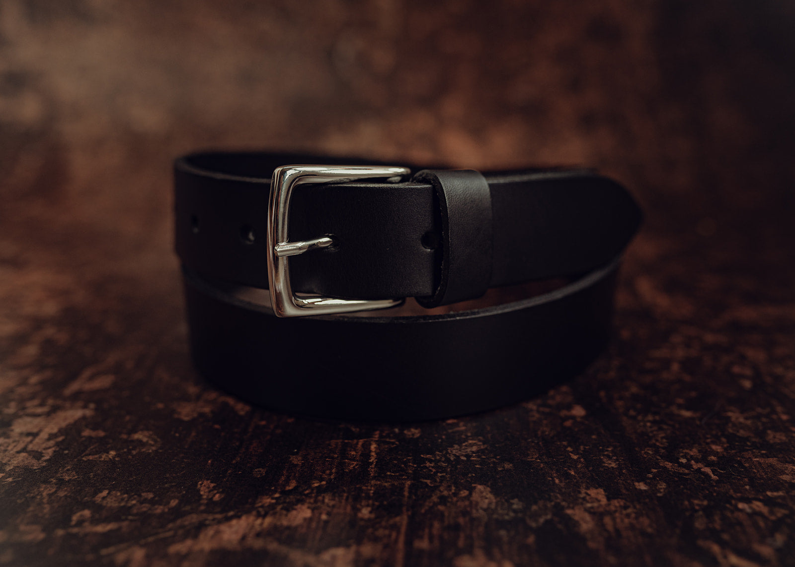 Narrow black leather belt