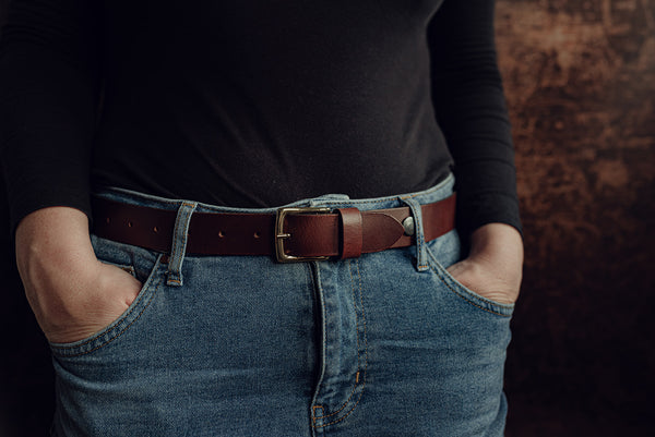 Female model wearing brown leather belt